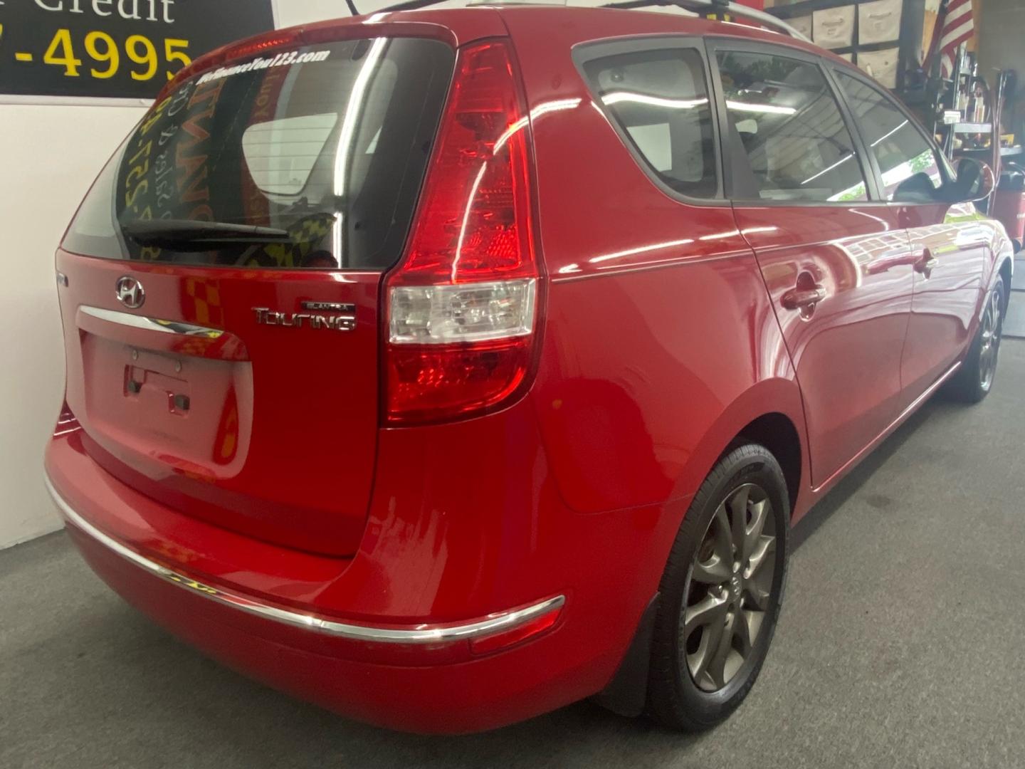 2012 RED /Gray Hyundai Elantra Touring SE Manual (KMHDC8AE5CU) with an 2.0L L4 DOHC 16V engine, 5-Speed Automatic transmission, located at 533 S West End Blvd., Quakertown, PA, 18951, (877) 257-4995, 40.343994, -75.303604 - INCLUDED IN THE SALE PRICE OF EVERY VEHICLE: 48 Hour Money Back Guarantee 6 Month - 6,000 Mile Warranty Brand New PA State Inspection & Emission $10 Oil Changes for the Life of the Loan Complete CARFAX - Photo#3